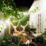 Fotos de iluminación de jardines pequeños