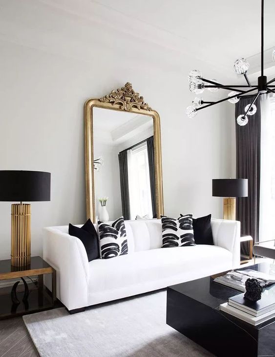 Salas elegantes decoradas en blanco con negro